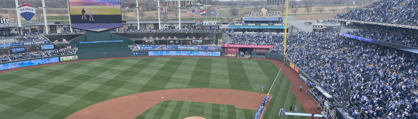 Photo: Royals Kyle Isbel Dives Toward Home Plate on Opening Day